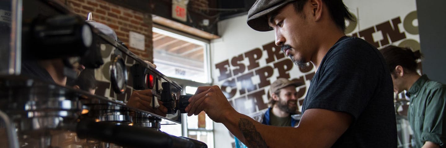 man making coffee at Octane